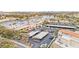 Commercial space by a lake with a parking lot, stores, and palm trees at 2608 Sun Reef Rd, Las Vegas, NV 89128