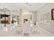 Contemporary dining room featuring a modern light fixture and fireplace at 2608 Sun Reef Rd, Las Vegas, NV 89128