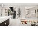 Open-concept space featuring a staircase, wine rack, and living room at 2608 Sun Reef Rd, Las Vegas, NV 89128