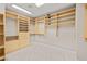 Well-organized walk-in closet with custom shelving and ample storage space at 2608 Sun Reef Rd, Las Vegas, NV 89128
