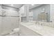 This remodeled bathroom features tile floor, updated vanity, new toilet and tiled shower at 2645 Heritage Ct, Las Vegas, NV 89121