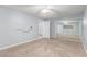 This bedroom features carpet, mirrored closet doors, ceiling fan, and blue walls at 2645 Heritage Ct, Las Vegas, NV 89121