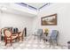 Sunny breakfast nook featuring bright natural light, tiled floors, and view of the backyard at 2645 Heritage Ct, Las Vegas, NV 89121