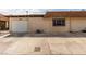 Image of a home's exterior with a white garage door and a concrete driveway at 2645 Heritage Ct, Las Vegas, NV 89121