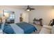 Bright bedroom with fan leading to other rooms in the home at 2649 Golden Sands Dr, Las Vegas, NV 89128