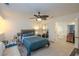 Well-lit bedroom leading to the upper level and other rooms of the home at 2649 Golden Sands Dr, Las Vegas, NV 89128