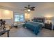 Bedroom with recessed wall lighting, a fan and large windows at 2649 Golden Sands Dr, Las Vegas, NV 89128