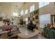 Bright living room with high ceilings and lots of art at 2649 Golden Sands Dr, Las Vegas, NV 89128