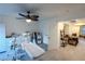 Flexible space with large ceiling fan, tiled floors, and additional seating at 2649 Golden Sands Dr, Las Vegas, NV 89128