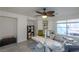 A bright room featuring a ceiling fan, natural light, and professional equipment at 2649 Golden Sands Dr, Las Vegas, NV 89128