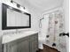 Bathroom featuring a light grey vanity and a cat themed shower curtain at 2761 Phoenix St, Las Vegas, NV 89121