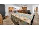 Dining area with open access to the kitchen, brick fireplace and living areas at 2761 Phoenix St, Las Vegas, NV 89121