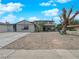 Charming two-story home with low-maintenance front yard and covered porch at 2761 Phoenix St, Las Vegas, NV 89121