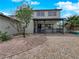 Inviting home with covered front porch and manicured gravel landscaping at 2761 Phoenix St, Las Vegas, NV 89121