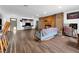 Open concept living room with wood floors, fireplace, and eclectic decor at 2761 Phoenix St, Las Vegas, NV 89121
