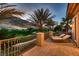 Scenic balcony view overlooking a lush golf course, framed by palm trees and wrought iron railings at 2845 Red Arrow Dr, Las Vegas, NV 89135