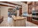 Gourmet kitchen features custom cabinets, large island, and high-end stainless steel appliances at 2845 Red Arrow Dr, Las Vegas, NV 89135
