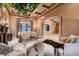 Elegant living room featuring coffered ceilings, a decorative fireplace, and tasteful decor at 2845 Red Arrow Dr, Las Vegas, NV 89135
