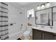 Bathroom with a shower-tub combo, updated vanity, and decorative accents at 3000 Morning Ridge Dr, Las Vegas, NV 89134