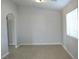 Serene bedroom featuring neutral walls, tile flooring, and natural light for a peaceful retreat at 3020 Peggy Ave, Pahrump, NV 89048