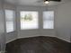 Bedroom featuring a ceiling fan and multiple windows for natural light at 3020 Peggy Ave, Pahrump, NV 89048