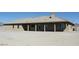 Spacious ranch-style home with covered back patio and large lot at 3020 Peggy Ave, Pahrump, NV 89048