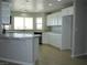 Spacious kitchen offering white cabinets, stainless steel appliances, and generous counter space for meal preparation at 3020 Peggy Ave, Pahrump, NV 89048