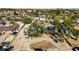 Bird's eye view showcases a well-maintained home with desert landscaping, mature trees, and a circular driveway at 3100 Garehime St, Las Vegas, NV 89108