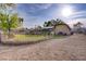 A large backyard is enclosed with secure fencing and plenty of sunshine and room for recreation at 3100 Garehime St, Las Vegas, NV 89108