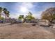 Large backyard with gravel and plenty of space for outdoor activities at 3100 Garehime St, Las Vegas, NV 89108