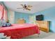 Bright bedroom with closet, ceiling fan, and carpeted floor at 3100 Garehime St, Las Vegas, NV 89108