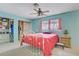 Cozy bedroom with ceiling fan, closet space, and comfortable furnishings at 3100 Garehime St, Las Vegas, NV 89108
