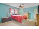 Charming bedroom featuring vintage furniture, ceiling fan, and carpeted floor at 3100 Garehime St, Las Vegas, NV 89108