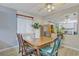 Dining room with table and seating, showing modern lighting and décor at 3100 Garehime St, Las Vegas, NV 89108