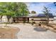 Close up of home entrance with mature landscaping, secure entry door, and charming details at 3100 Garehime St, Las Vegas, NV 89108