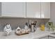 Decorated white quartz countertop with white upper cabinets and stainless steel accessories at 3100 Garehime St, Las Vegas, NV 89108