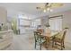 Kitchen dining area with a table and chairs, next to cabinets at 3100 Garehime St, Las Vegas, NV 89108