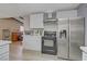 Kitchen with stainless steel appliances and white cabinets at 3100 Garehime St, Las Vegas, NV 89108