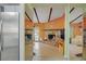Spacious living room with a fireplace and access to the backyard at 3100 Garehime St, Las Vegas, NV 89108