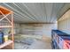 Clean storage shed interior with shelving, offering great storage options for tools, equipment, or other household items at 3100 Garehime St, Las Vegas, NV 89108
