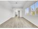 Bright bedroom features wood-look floors, neutral walls, two windows offering lots of natural light and closet space at 3444 Trilogy Dr, Las Vegas, NV 89108