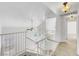 Open hallway with high ceilings and natural light showing access to multiple rooms at 3444 Trilogy Dr, Las Vegas, NV 89108