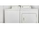 A white washer and dryer set in a well lit room ready for your laundry needs at 3444 Trilogy Dr, Las Vegas, NV 89108