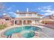 Inviting backyard features a refreshing pool and spa, perfect for outdoor relaxation and entertainment at 3755 Broadmead St, Las Vegas, NV 89147