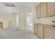 Upstairs hallway with ample cabinet space, carpet flooring, and natural light, leading to various rooms at 3755 Broadmead St, Las Vegas, NV 89147