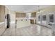 Spacious kitchen with stainless steel appliances and access to the pool at 3755 Broadmead St, Las Vegas, NV 89147