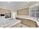 Modern kitchen with tiled countertops, stainless steel appliances and natural light at 3755 Broadmead St, Las Vegas, NV 89147