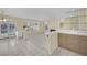 Open living area with wet bar, fireplace, and access to the backyard at 3755 Broadmead St, Las Vegas, NV 89147