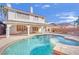 Beautiful pool and spa with a well-maintained backyard, perfect for relaxing and entertaining at 3755 Broadmead St, Las Vegas, NV 89147