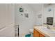 Clean half bathroom featuring a new vanity, decor and modern fixtures at 3840 Belle Glade St # 104, Las Vegas, NV 89129